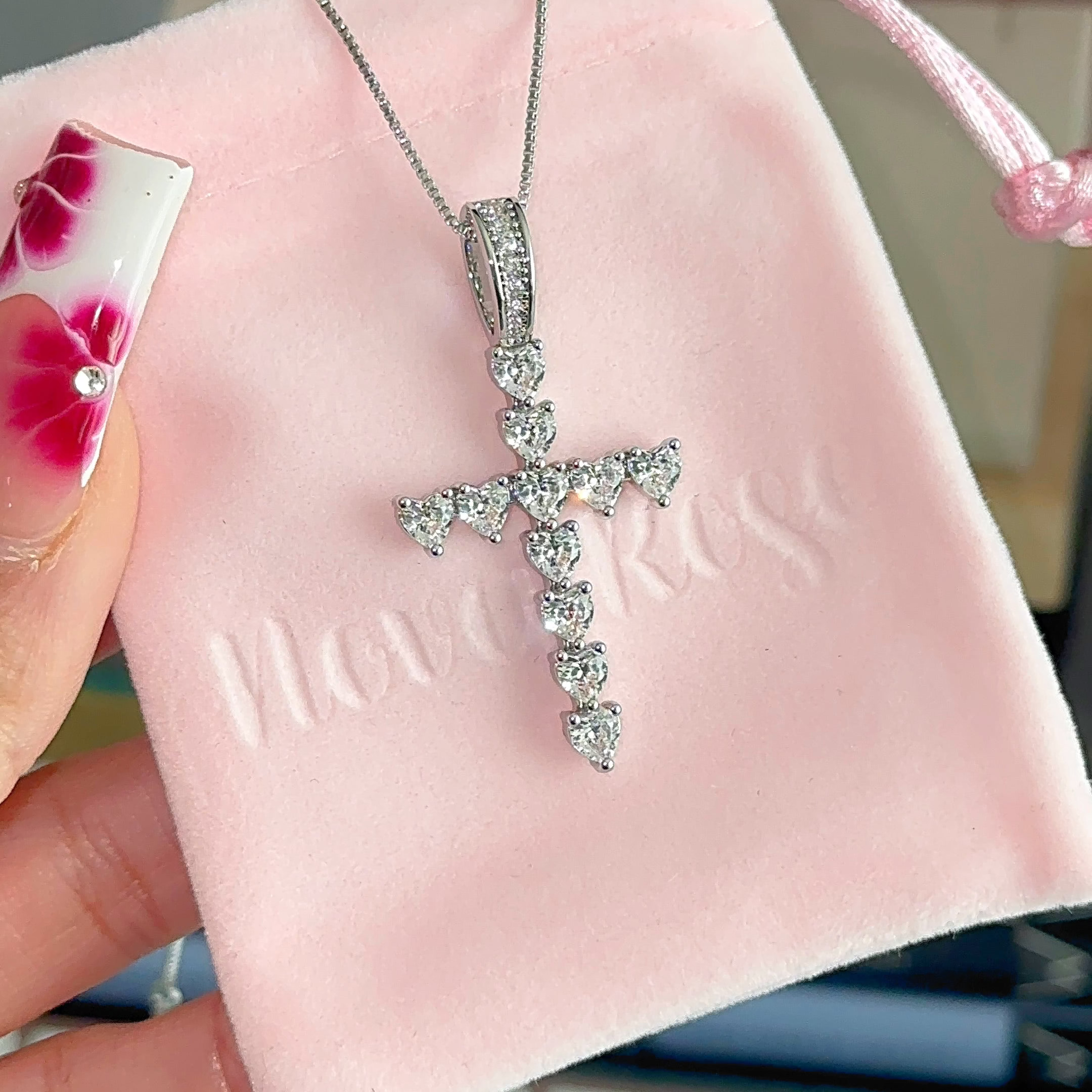 Radiant heart cross necklace