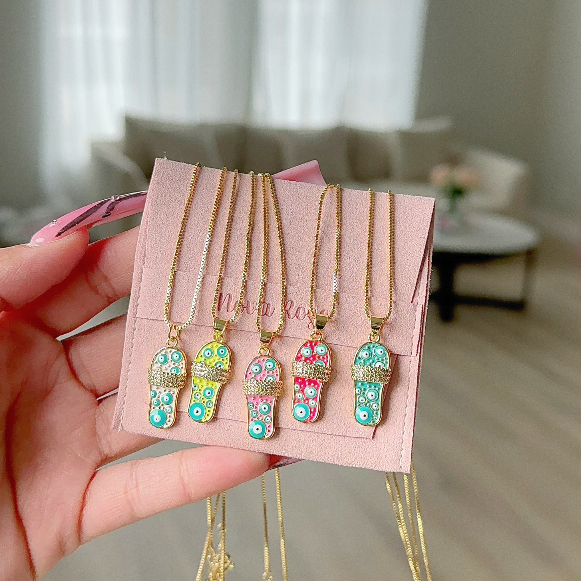 “Evil eye sandal” necklace