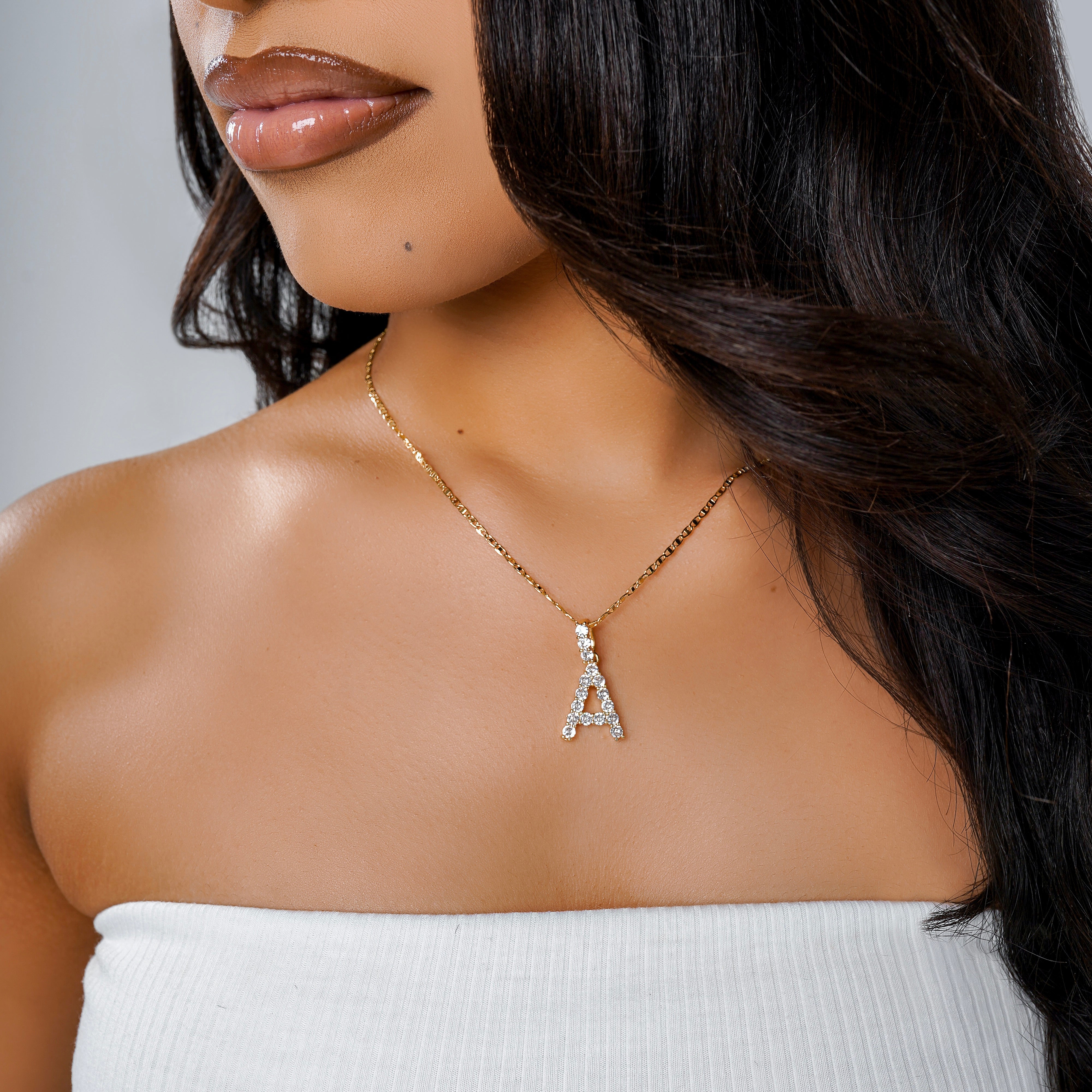 “She’s iconic” initial necklace