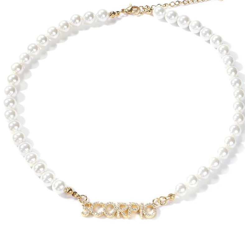 Pearl zodiac necklace